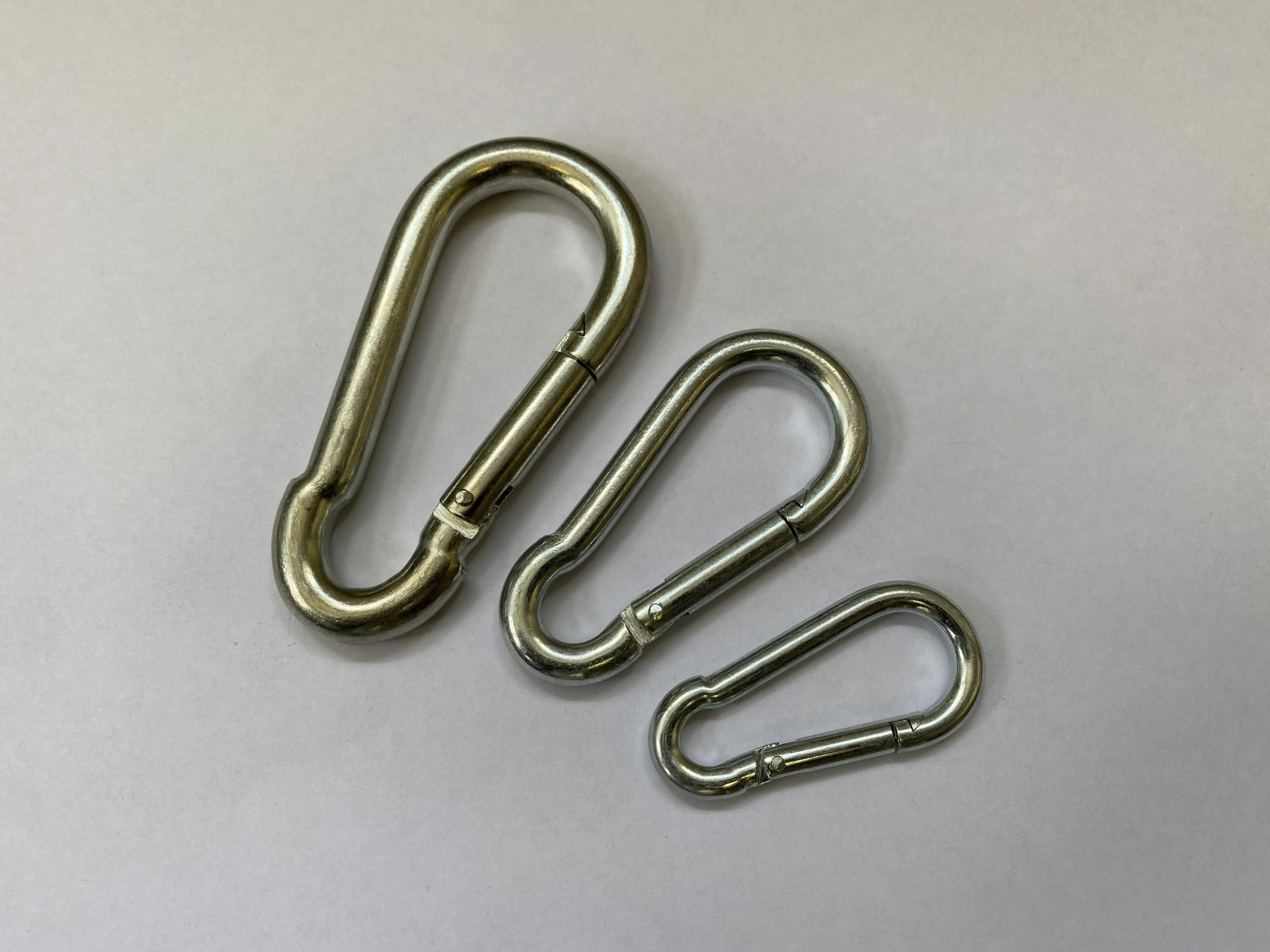 2025/08/1000082890-3.jpg Carabiner Hooks 7mm - Image 1